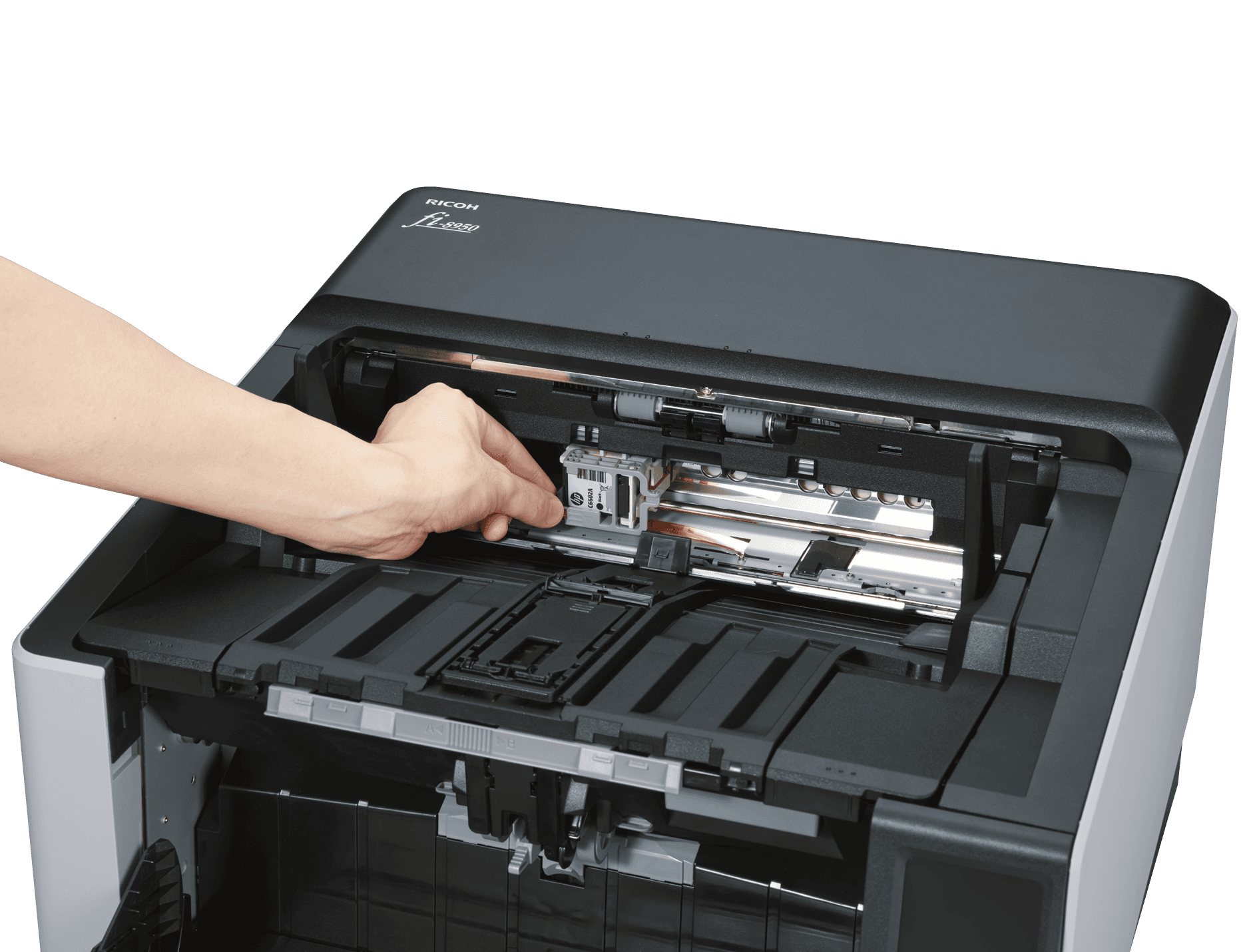 A hand replacing a part inside a Ricoh fi-8950 scanner